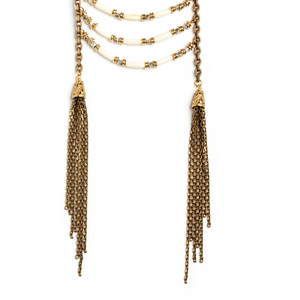 The Chain Event! This Vanessa Mooney necklace flaunts edged up style mixing a chunky Cuban link chain, ivory tube beads, brass & silver spacers and antique brass tassels. - Brass, resin beads, silver - 34" plus 6" tassels - Pullover style - Hand made in LA $222